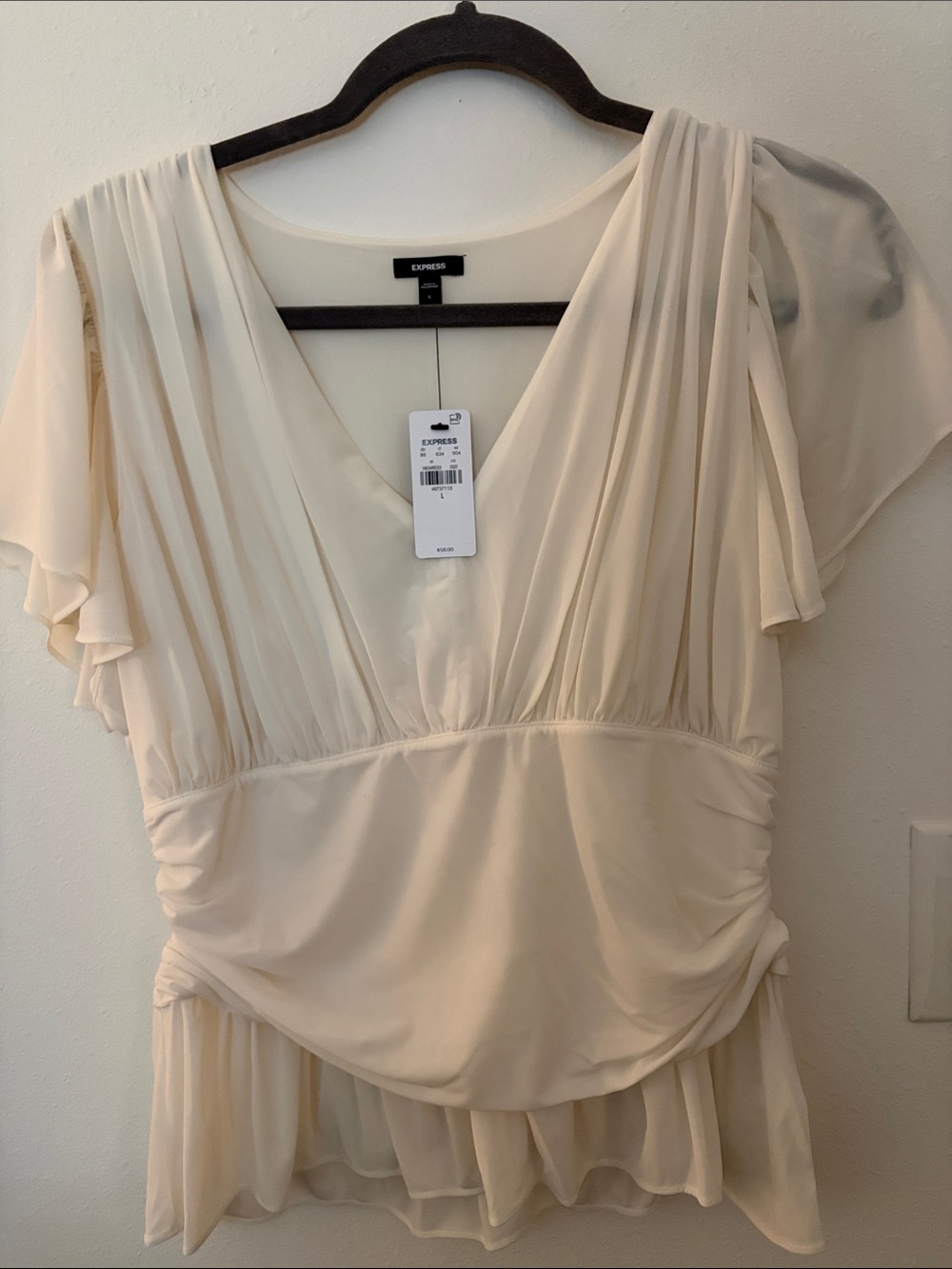 Express Cream V-Neck Flutter Sleeve Peplum top